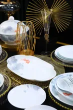 58头·白瓷鱼戏图餐具 · 8