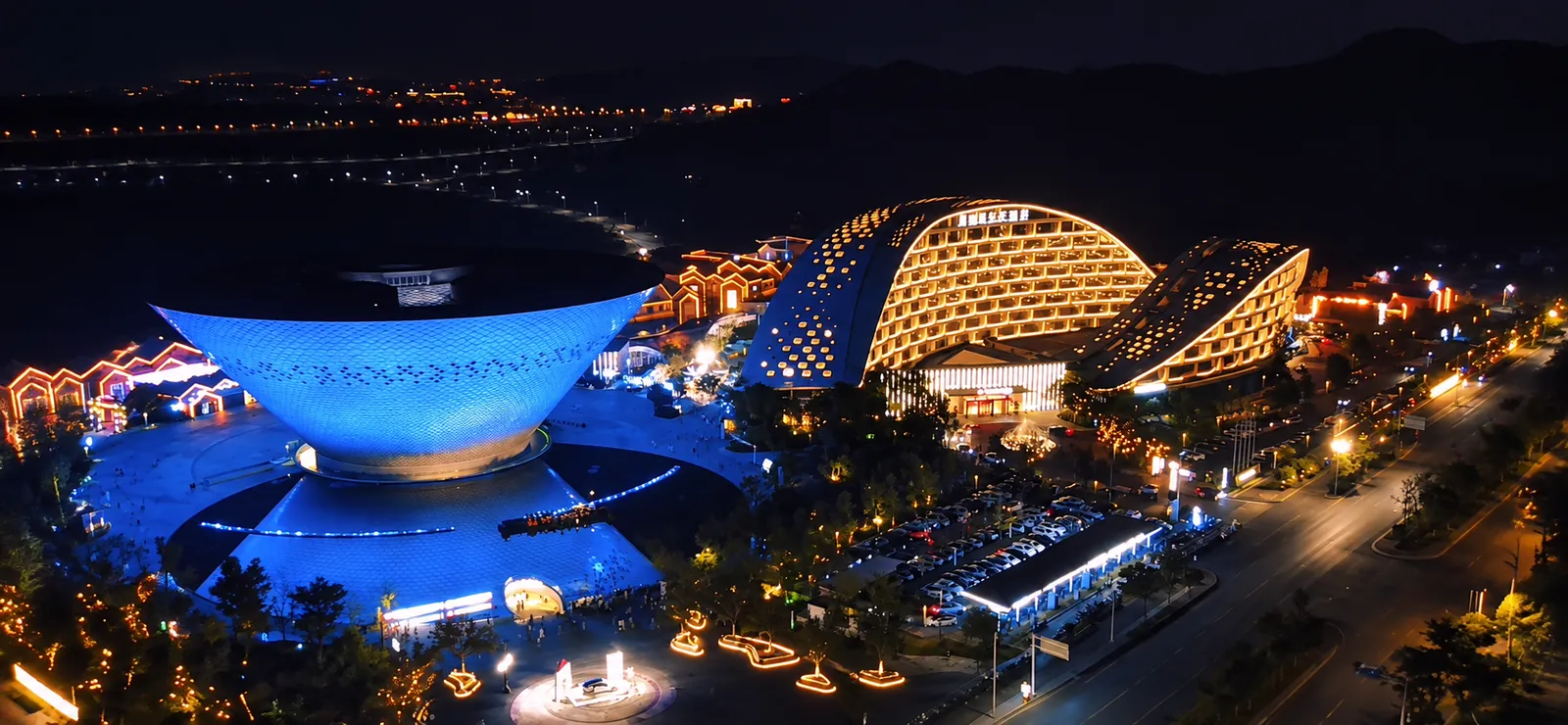 Illuminated ceramic inspired architecture at night